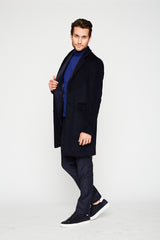 Side view on a model ARI Navy Wool-Angora Travel Coat. Made in italy