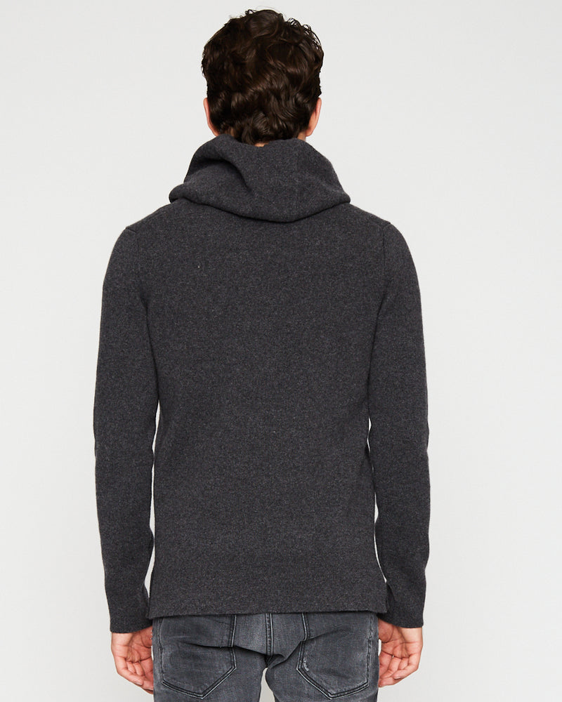 Back view on a model ARI Cashmere Knit Hoodie Charcoal. Made in Italy