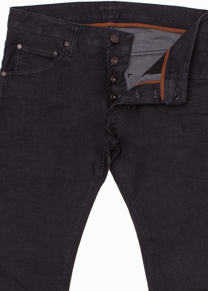 Detail view of Complete look of ARI Black Raw Stretch Denim Jeans. made in Italy