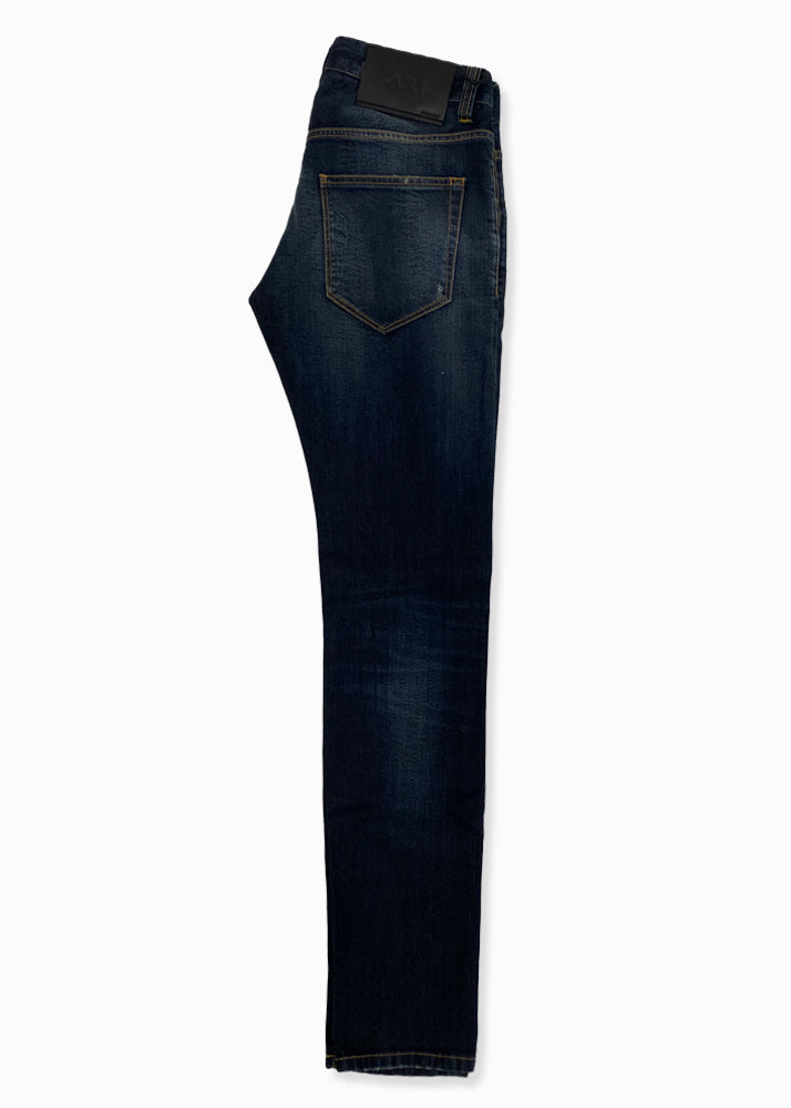 Side view of ARI Dark Blue Whiskered Stretch Denim Jeans. Made in Italy