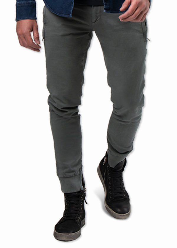Front view of ARI Grey Travel Jogger Pants. Made in Italy with shoes