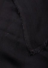 detail of ARI Black Cashmere Modal Scarf. Made in Italy