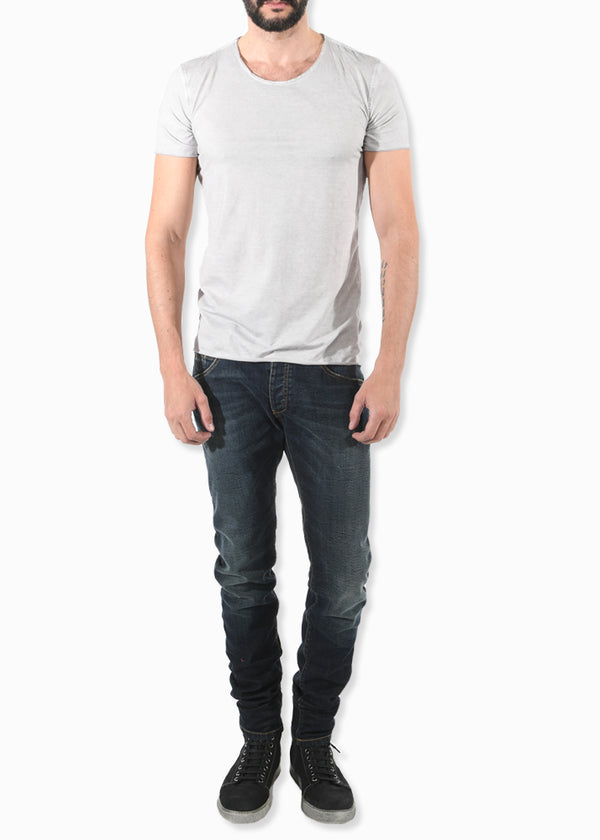 Complete look of Front view of ARI Dark Blue Whiskered Stretch Denim Jeans. Made in Italy